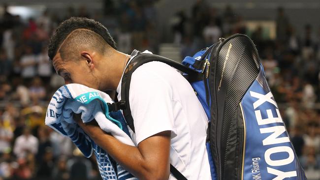 Nick Kyrgios walks off the court against Andreas Seppi.