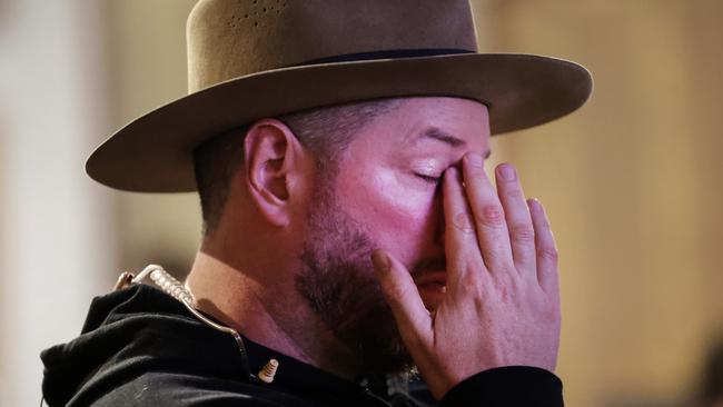 Prominent Yes campaigner Marcus Stewart wipes his eyes after the defeat of the Yes vote. Picture: David Caird