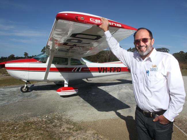 Island Scenic Flights owner/pilot Peter Steininger at the landing strip on Bruny Island. Picture: ROGER LOVELL