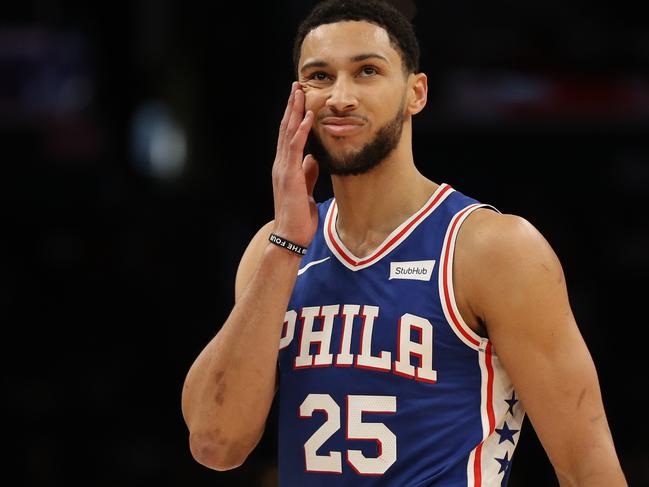 WASHINGTON, DC - DECEMBER 05: Ben Simmons #25 of the Philadelphia 76ers reacts against the Washington Wizards during the first half at Capital One Arena on December 5, 2019 in Washington, DC. NOTE TO USER: User expressly acknowledges and agrees that, by downloading and or using this photograph, User is consenting to the terms and conditions of the Getty Images License Agreement. (Photo by Patrick Smith/Getty Images)