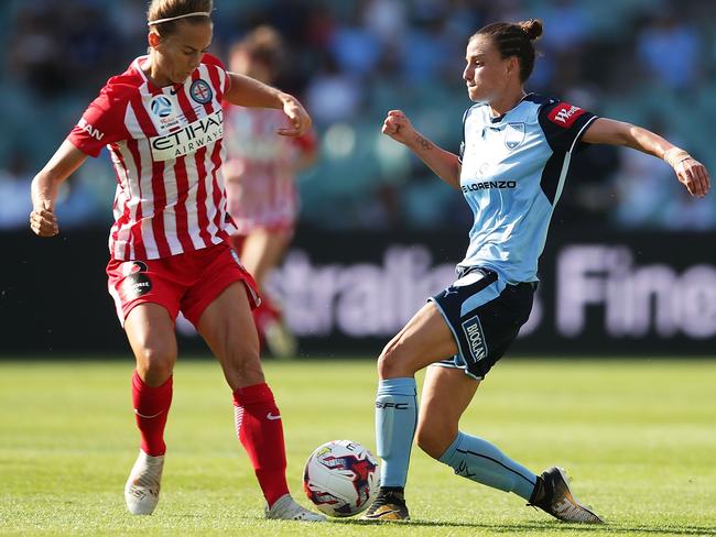 Chloe Logarzo of Sydney FC competes for the ball against Aivi Luik of Melbourne City during the W-League grand final at Allianz Stadium on Sunday. Picture: Getty Images