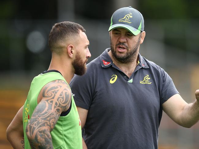 SYDNEY, AUSTRALIA - OCTOBER 20:  Wallabies coach Michael Cheika talks to Quade Cooper during an Austalian Wallabies training session at Leichhardt Oval on October 20, 2016 in Sydney, Australia.  (Photo by Mark Metcalfe/Getty Images)