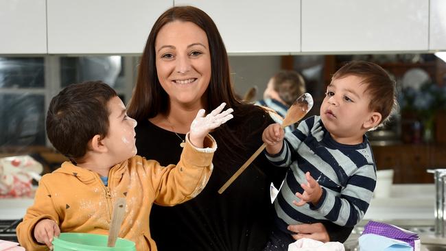 Dominique Aprea, with children Mitchell and Nicholas, buys supermarkets’ own brands to try to save money. Picture: Tony Gough