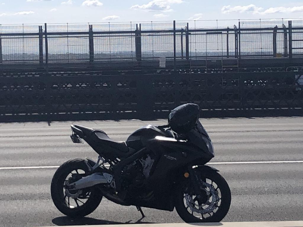 A motorcyle with a helmet on the hendlebars just north of the Sydney harbour bridge crash scene.