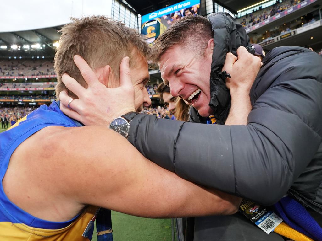 Mark LeCras ocelebratesith former teammates Beau Waters during the 2018 AFL Grand Final. (Photo by Michael Dodge/AFL Media/Getty Images)