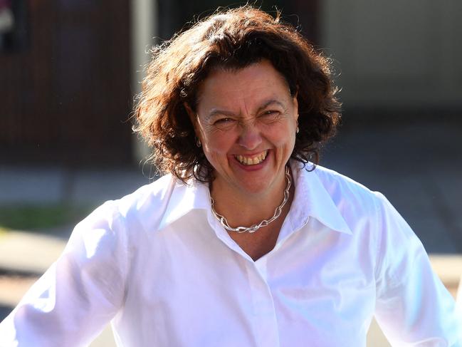 Independent candidate Monique Ryan speaks to voters at a polling booth as she challenges Australia's Treasurer Josh Frydenberg in the Liberal seat of Kooyong in Melbourne on May 21, 2022. (Photo by William WEST / AFP)