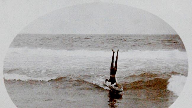 Osric Notley's now famous photo of Tommy Walker doing a headstand at Main Beach Yamba during the Surf Life Saving Season of 1911/12