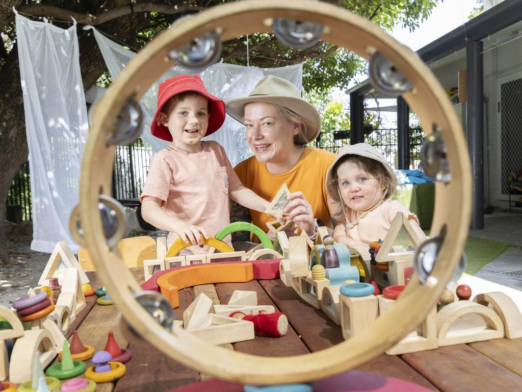 Educational Leader Davinia Munn at Goodstart Early Learning in Red Hill with five-year-old Ned and three-year-old Sophie, Wednesday, October 23, 2024 - Picture: Richard Walker