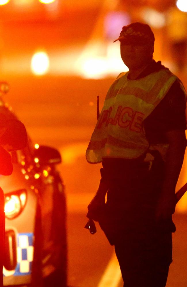 A police officer on the scene of the fatal Alexandra Hills crash. Picture: Steve Pohlner