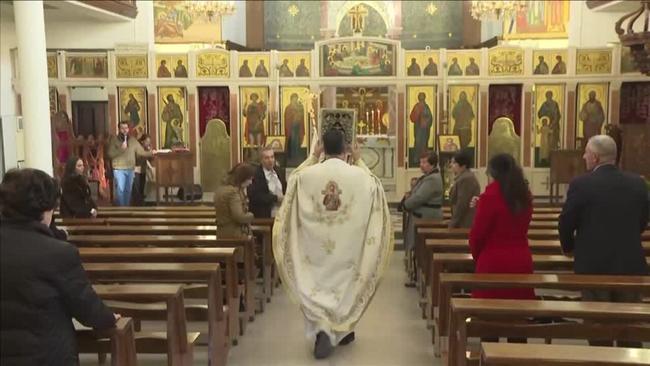 Syrian Christians attend their first Christmas mass post-Assad