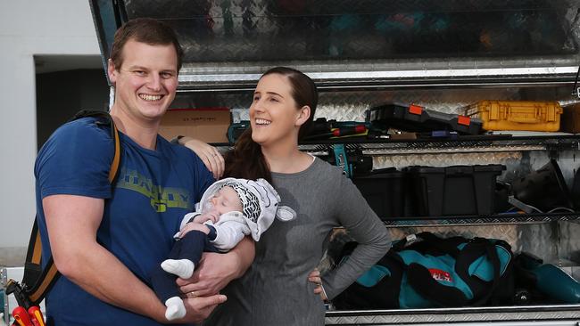 Andrew Pearce with wife Loretta and baby Jackson. Picture: Toby Zerna