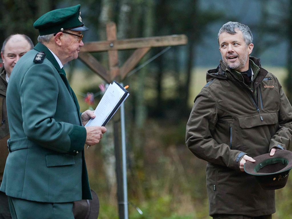 The future king of Denmark with Master Court Hunter Jens Bjerregaard Christensen during the royal hunt. Picture: AFP