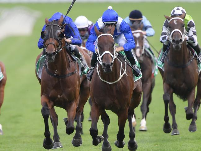 Hugh Bowman presses the button and Winx responds. 