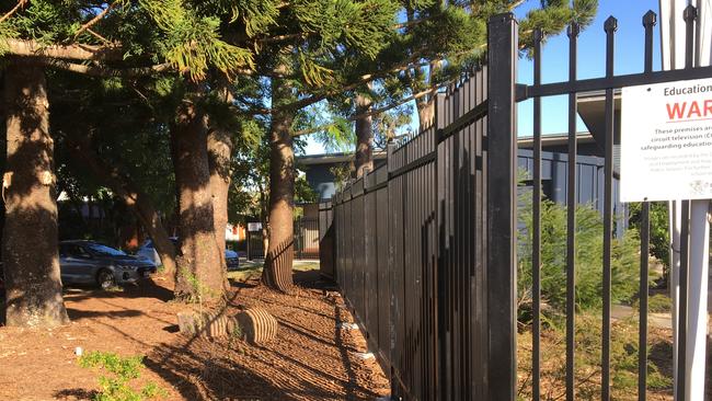 Sharp spikes are at the top of the 2m high fences.