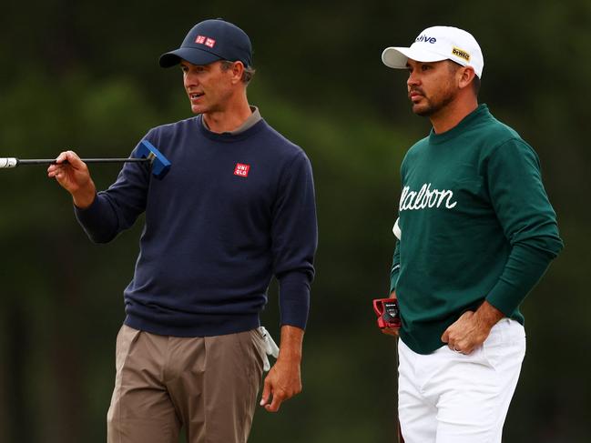 AUGUSTA, GEORGIA - APRIL 09: Adam Scott and Jason Day of Australia talk on the 17th green during a practice round prior to the 2024 Masters Tournament at Augusta National Golf Club on April 09, 2024 in Augusta, Georgia.   Maddie Meyer/Getty Images/AFP (Photo by Maddie Meyer / GETTY IMAGES NORTH AMERICA / Getty Images via AFP)