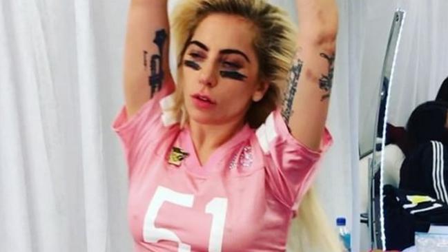 Lady Gaga ... "Gettin' too funky in the dressing room. While my best friends side eye me from the couch for bein a ham, so happy my friends and family are. Let's go men it's gametime!" Picture: Instagram