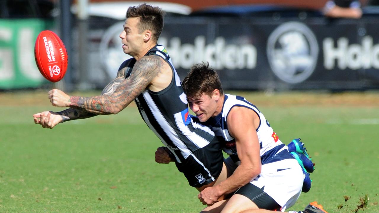Geelong's Luke Kiel tackles Collingwood's Jamie Elliott during their VFL match at Olympic Park, Melbourne. Picture: Andrew Henshaw