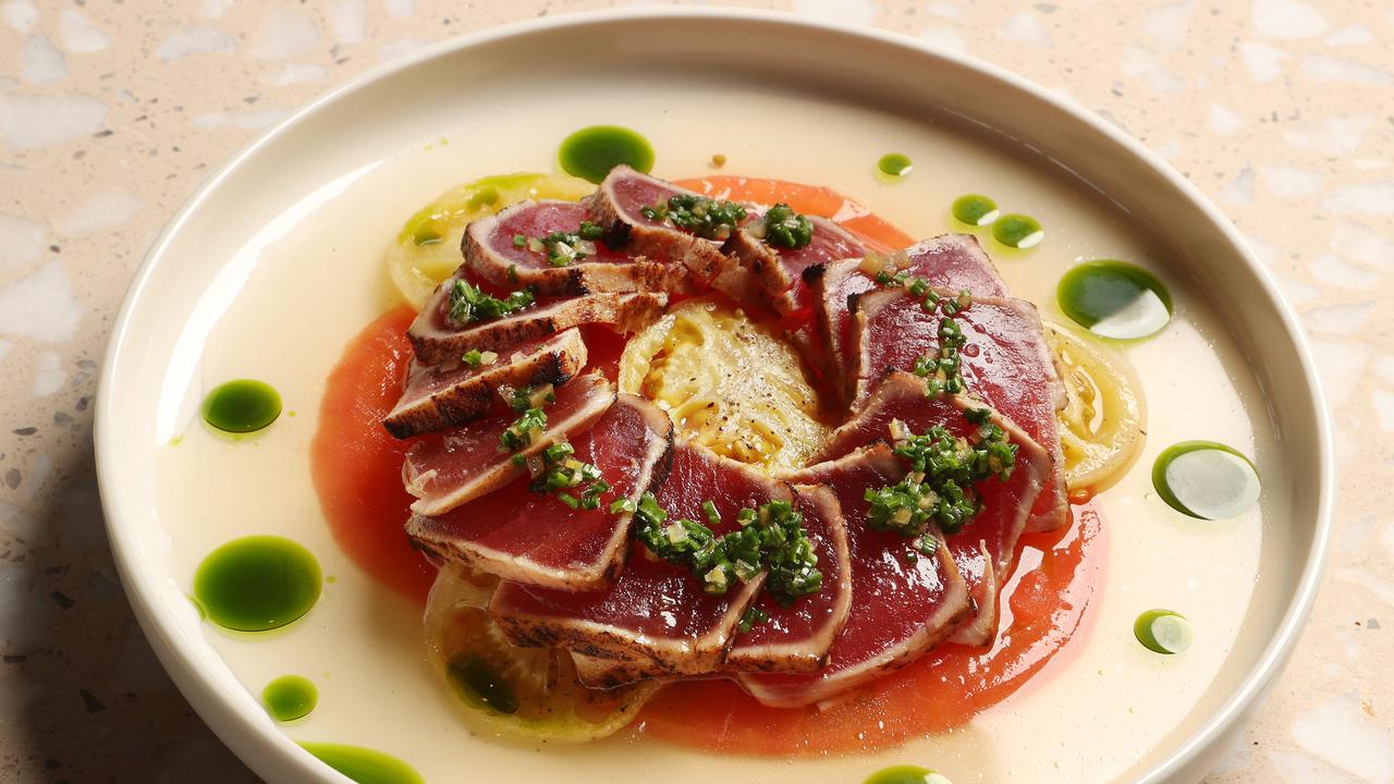 Seared tuna crudo, with jus de cacao, smoked tomatoes and shallot oil, Herve’s in Albion. Picture: Liam Kidston