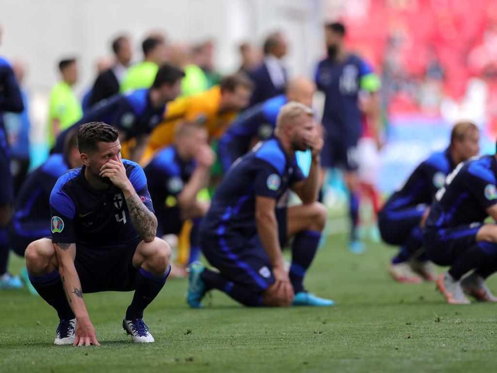 Finnish players look dejected.