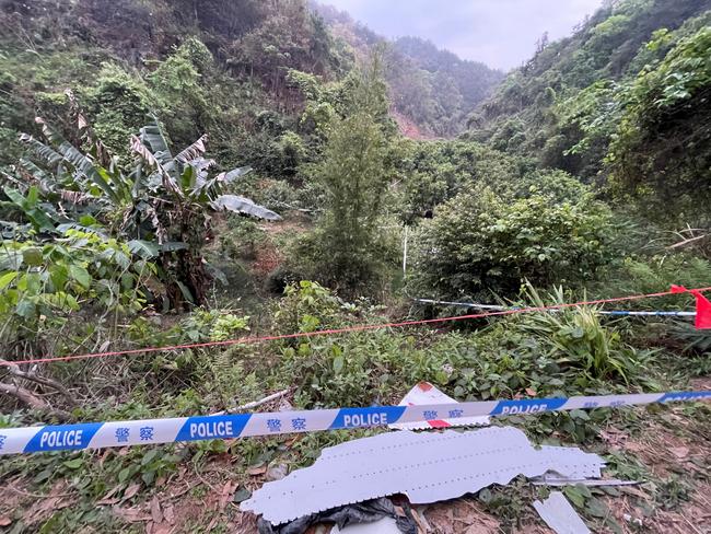 Pieces of the crashed passenger plane in Tengxian County, south China's Guangxi Zhuang Autonomous Region. Picture: Xinhua via Getty Images