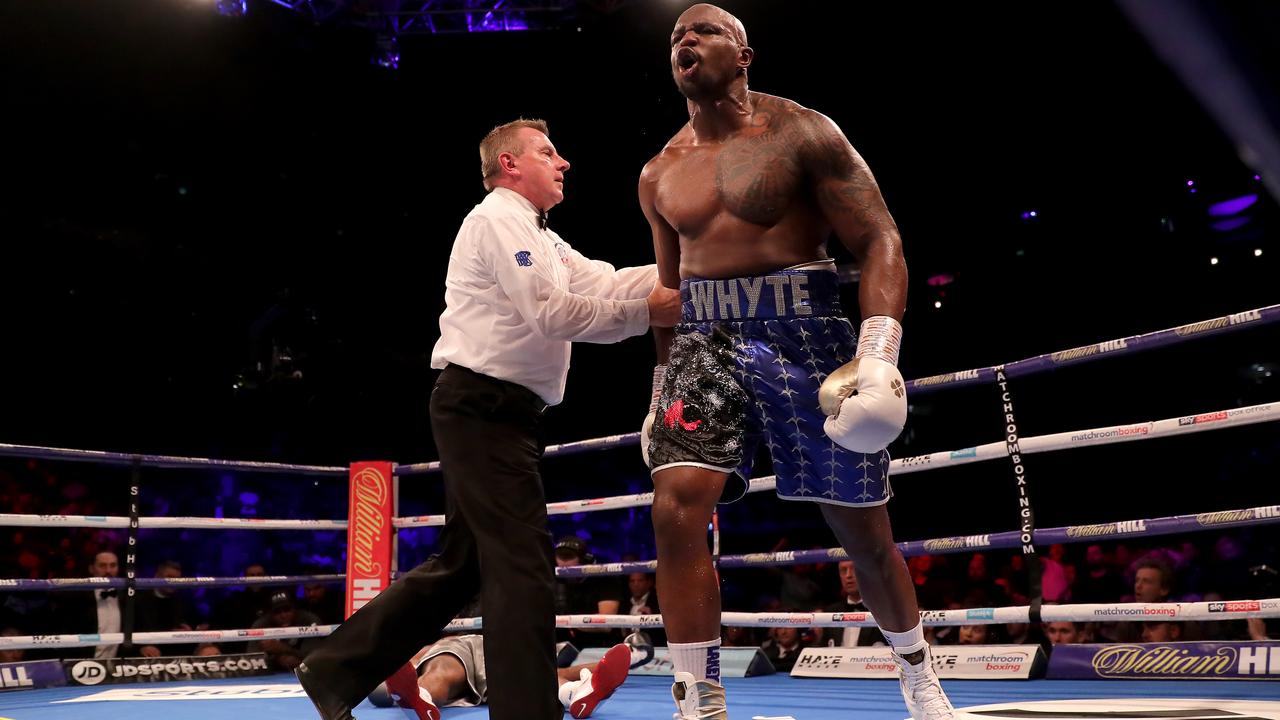 Dillian Whyte celebrates knocking out Derek Chisora. Photo by Richard Heathcote/Getty Images