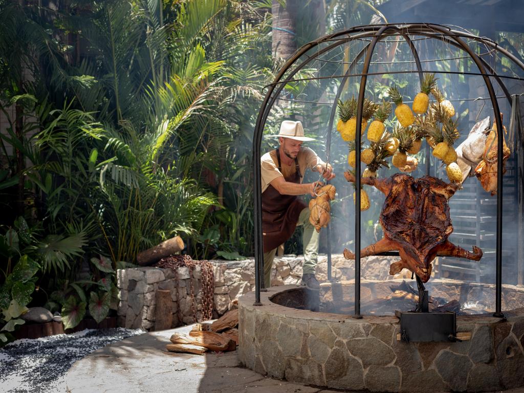 Chef Charly Pretet, 38, of Noosaville-based Terra Firma Dining, cooks using open fire cooking inspired by the traditional Argentinian method of Asado at the Shelter Pererenan restaurant in Pererenan, Bali in March. Mr Pretet helped open the restaurant's new dedicated open fire cooking space. Picture: Valeria Ramirez