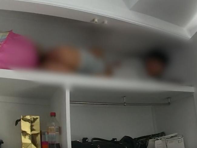 Four teenagers have been charged over a string of property offences across Brisbane, with footage released by police showing the teenagers hiding in cupboards during their arrest.