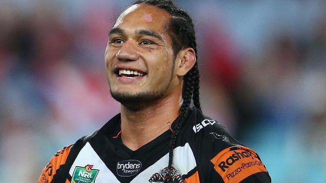 SYDNEY, AUSTRALIA - JULY 24: Martin Taupau of the Wests Tigers laughs as he leaves the field after being given ten minutes in the sin bin during the round 20 NRL match between the Wests Tigers and the Sydney Roosters at ANZ Stadium on July 24, 2015 in Sydney, Australia. (Photo by Mark Kolbe/Getty Images)