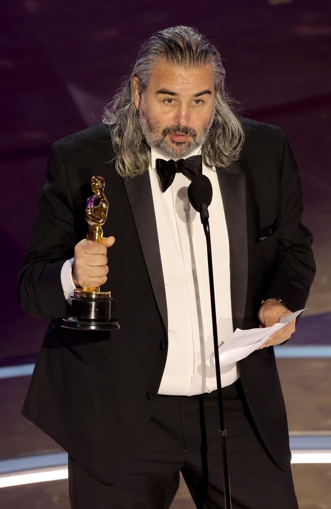 Hoyte van Hoytema accepts the Best Cinematography award for "Oppenheimer". Picture: Getty Images