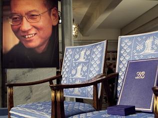  The empty chair, diploma and medal that should have been awarded to this year's Nobel Peace Prize winner Liu Xiaobo, photo a...