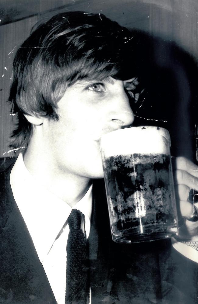 Ringo enjoys a beer in Australia in 1964. Picture: News Corp