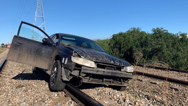 A man has been arrested for allegedly evading police and smashing into a patrol car on Friday morning. Picture: SA Police