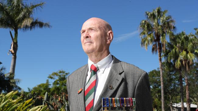 Vietnam veteran Clive Mitchell-Taylor, 72, is one of the many military resident at Seachange Lifestyle Resorts. Clive in front of the resorts Cenotaph. Picture Glenn Hampson