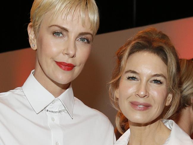 Charlize Theron, left, and Renee Zellweger are seen at the 92nd Academy Awards Nominees Luncheon at the Loews Hotel on Monday, Jan. 27, , left, and 2020, in Los Angeles. (Photo by Danny Moloshok/Invision/AP)