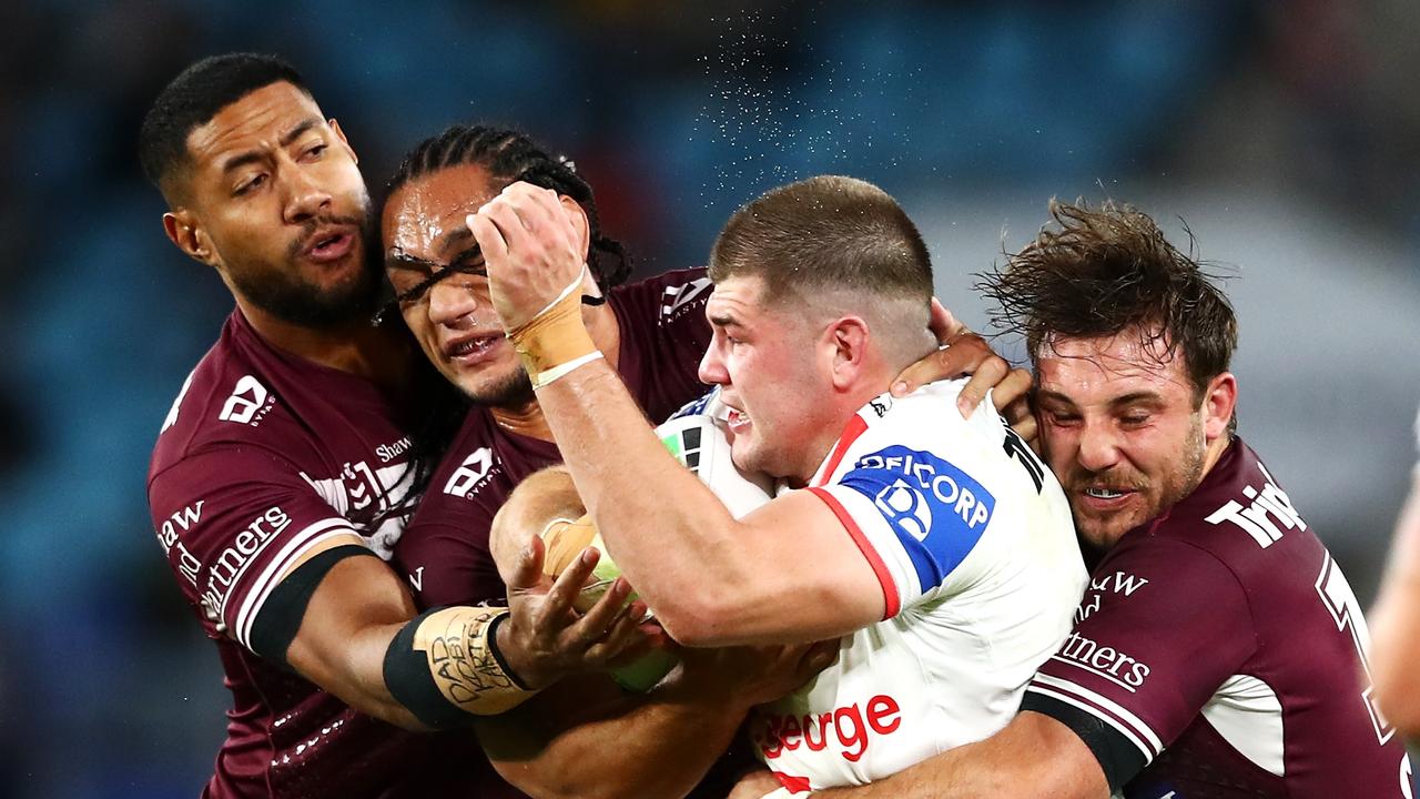 The win has come at a cost for Manly, after Karl Lawton (far right) was rushed to hospital with a back injury. Picture: Getty Images.