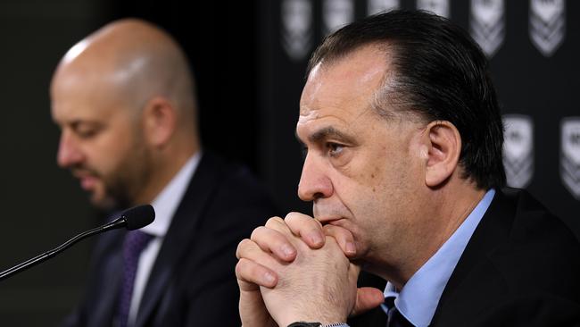 NRL CEO Todd Greenberg (left) and ARLC Chairman Peter V'landys speak to the media in Sydney, Sunday, March 15, 2020. (AAP Image/Joel Carrett) NO ARCHIVING