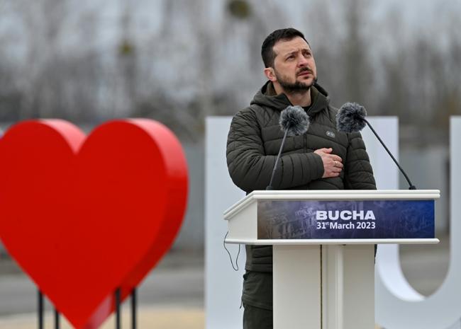 Ukrainian President Volodymyr Zelensky vowed Russia would be defeated speaking in Bucha were Moscow's forces were accused of war crimes