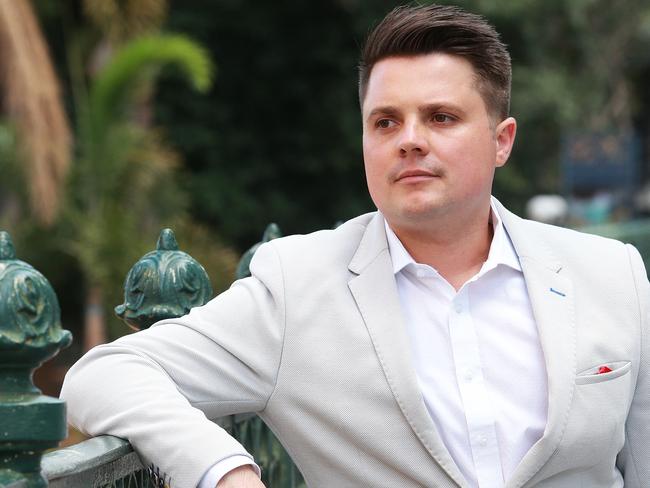 Dominic Holland CEO and Managing Director of Tow.com.au poses on Queen Street in Brisbane on Monday, October 9, 2017. Mr Holland has filed a $15.4 million lawsuit against the Queensland Government in the Supreme Court. (AAP Image/Claudia Baxter)