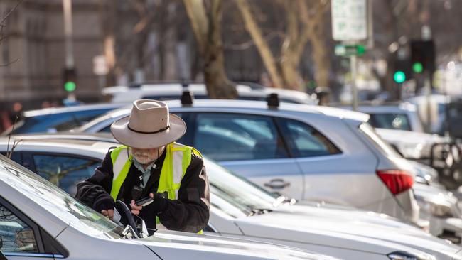 A City of Melbourne parking inspector. Picture: Jason Edwards