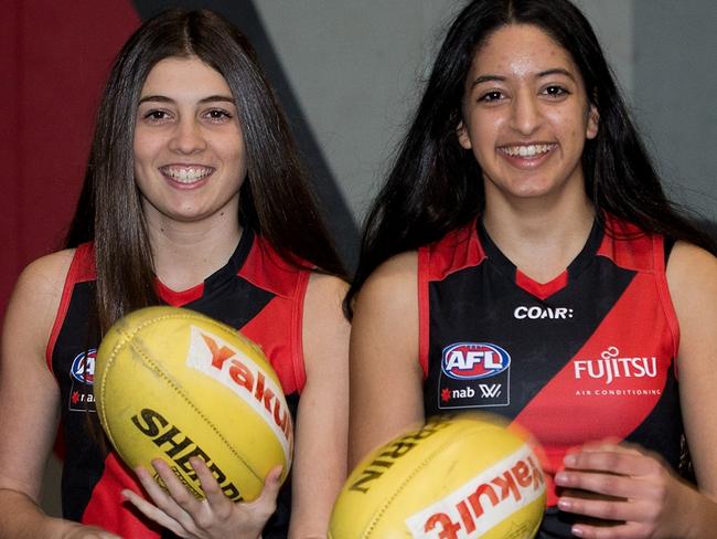 Prospective Essendon AFLW players with Calder Cannon girls.  Must Credit Picture: Ben Johnstone