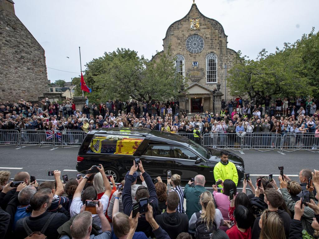 People gather on the Royal Mile at Canongate Kirk to watch the cortege carrying the coffin of the late Queen. Picture: /Getty Images