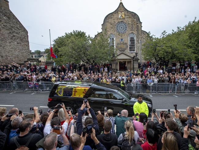 People gather on the Royal Mile at Cannongate Kirk to watch the cortege carrying the coffin of the late Queen. Picture: /Getty Images