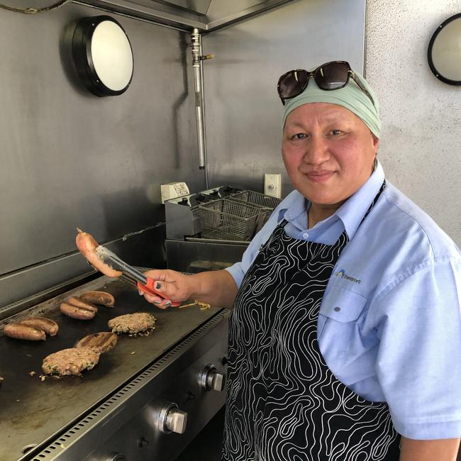 Sarah Taranaki, a driver at the Keolis Downer Brookvale Bus Depot cooking breakfasts for her colleagues in the Brookvale Bus Institute on Friday, told Minister Haylen that better wages and conditions would keep drivers in the industry. Picture: Jim O'Rourke