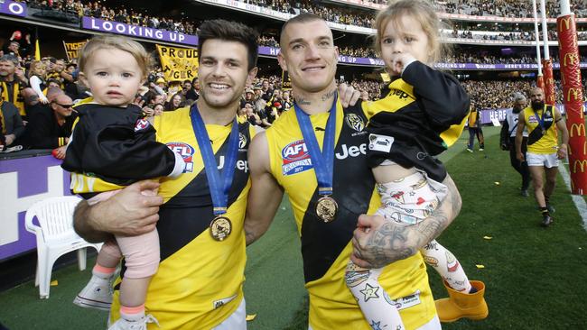 Trent Cotchin and Dustin Martin with Cotchin’s daughters. Picture: David Caird