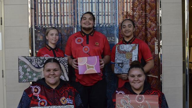 Hymba Yumba artists (clockwise from back left) Jamelia Maybanks, Jerimiah Wylie-Coolwell, Talen Bourne, andJanaya and Jinali Fox (front).