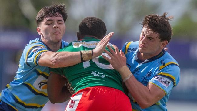 James Grey and Hayden Polson make a tackle.