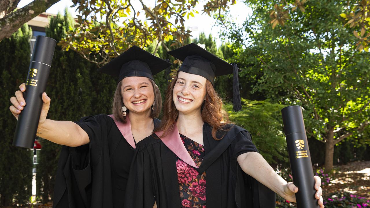 Dani Challacombe (left) and Sarah Mitchell celebrate graduating together with a Bachelor of Education (Secondary) at a UniSQ graduation ceremony at The Empire. Sarah graduates with Distinction, Tuesday, October 29, 2024. Picture: Kevin Farmer