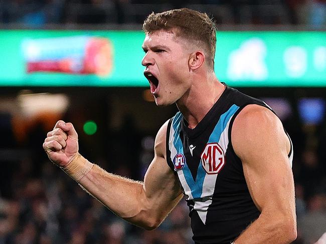 ADELAIDE, AUSTRALIA – MAY 30: Mitch Georgiades of the Power celebrates a goal during the 2024 AFL Round 12 match between the Port Adelaide Power and the Carlton Blues at Adelaide Oval on May 30, 2024 in Adelaide, Australia. (Photo by Sarah Reed/AFL Photos via Getty Images)