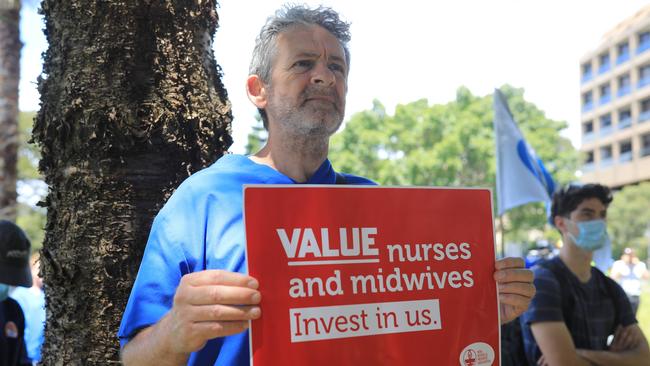 Protesters outside NSW Parliament House. The state Budget imposes a 1.5 per cent cap on public sector pay rises. Picture: NCA NewsWire / Christian Gilles