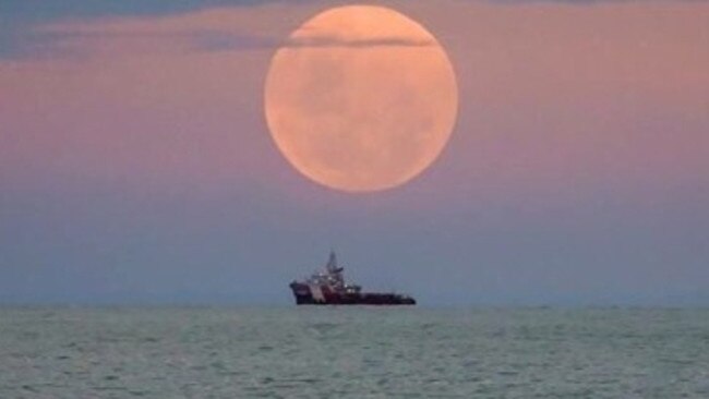 Charlotte Hellings took this gorgeous ‘super blue blood moon’ photo from Kewarra Beach in Cairns. Picture: Supplied